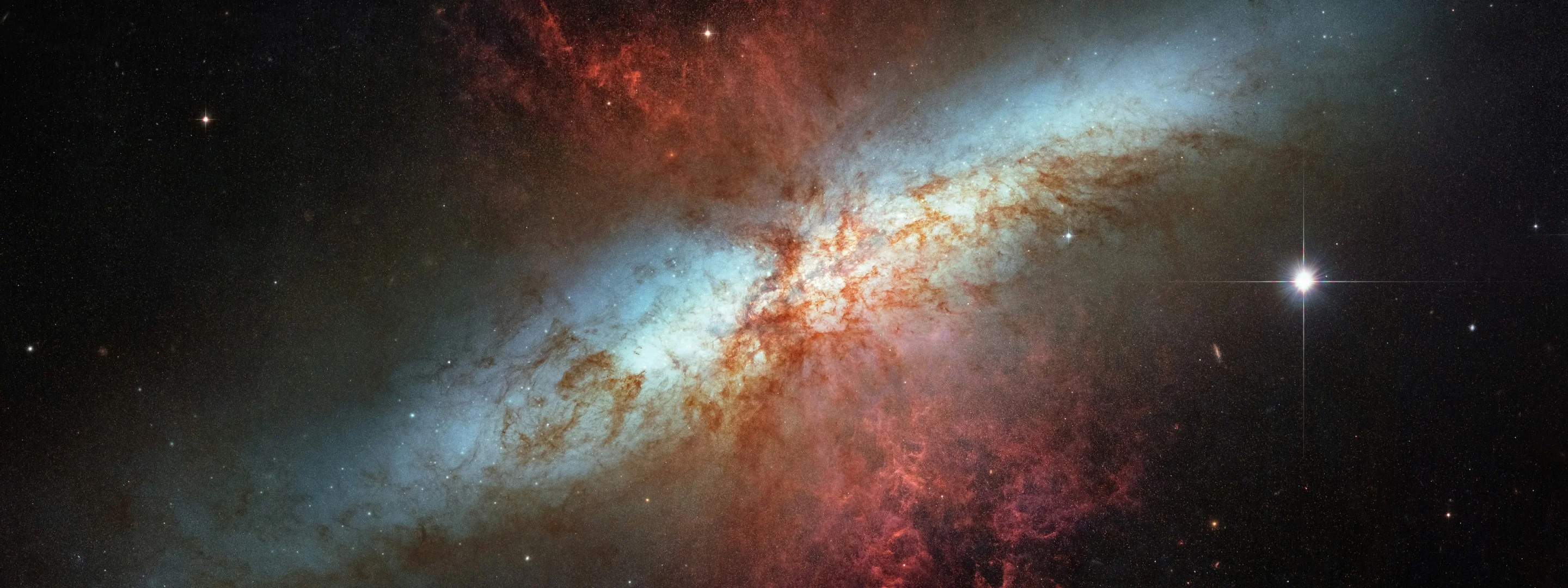 The Cigar Galaxy (Messier 82) — the deep-space photograph that inspired the brand