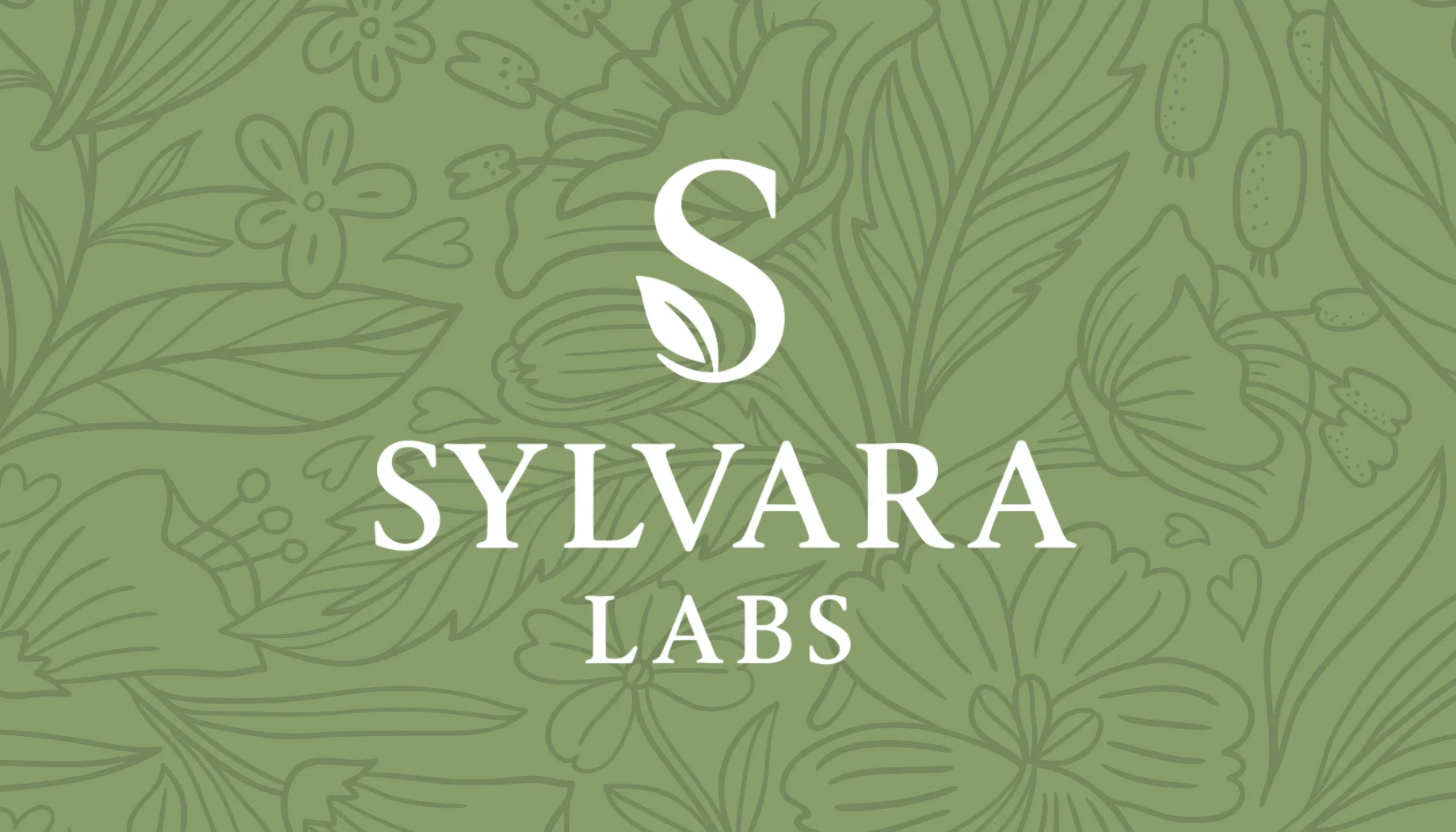 Sylvara Labs business card — logo on the botanical floral pattern